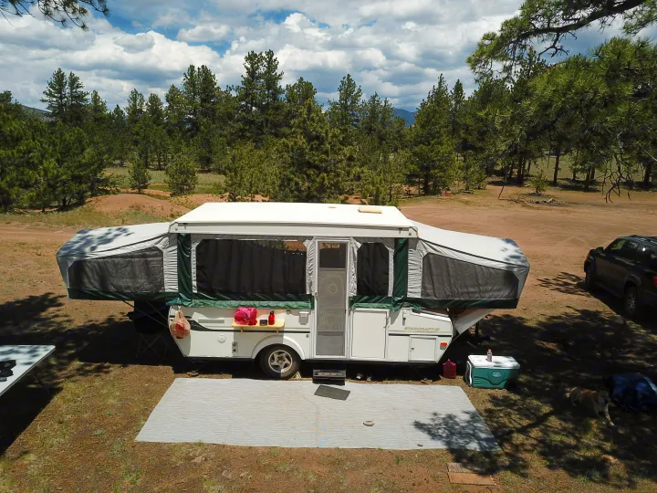Front of camper with the outdoor mat.. Starcraft Centennial 2004