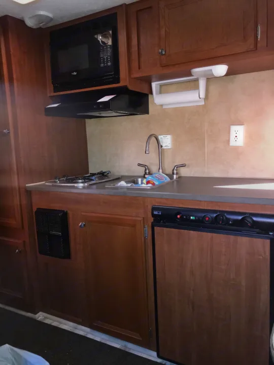 Black box is cabin heater, sink, fridge vent hood, storage cabinet. its all there. . Jayco Camper Trailer- Swift 2012