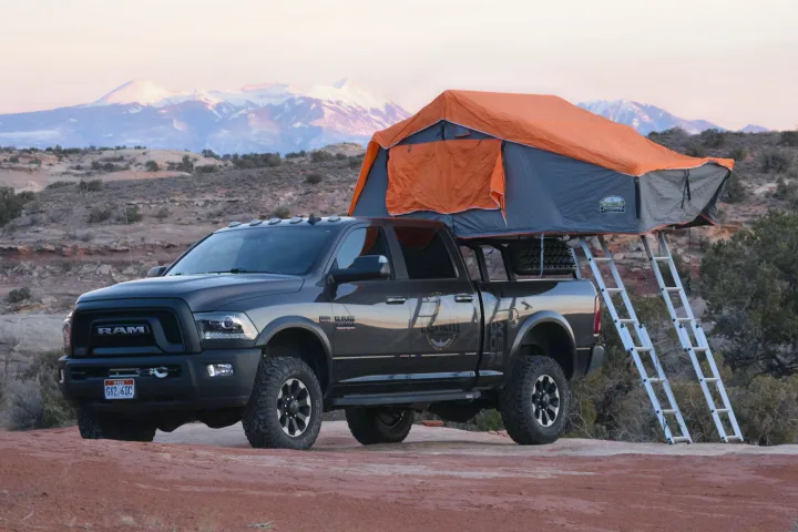Explore the backcountry with this Ram truck RV rental featuring a spacious rooftop tent. Ideal for desert and mountain adventures.. RAM Power Wagon 2018