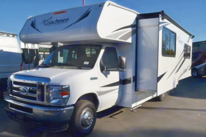 A white Coachmen Freelander Class C RV rental, featuring an extended slide-out for extra living space.. Coachmen Freelander 2022