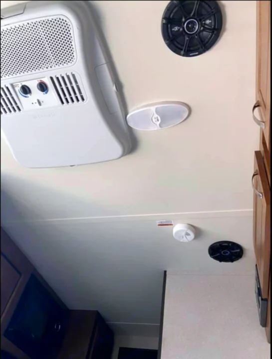 RV rental comfort: AC unit, dual speakers, and smoke detector visible on the ceiling.. Forest River Salem Cruise Lite 2017