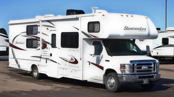 This white Class C Sunseeker RV rental is parked, ready for your next motorhome adventure.. Forest River Sunseeker 2015