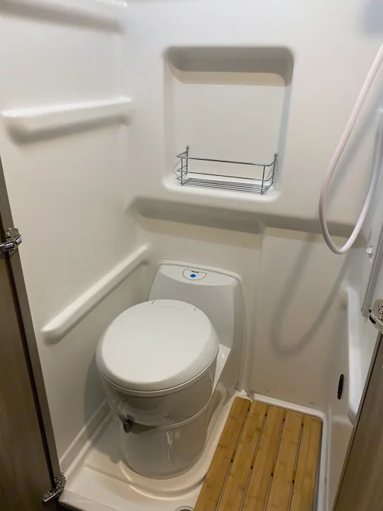 This is the bathroom with a toilet and indoor shower (not available to renters).. Winnebago Other 2021