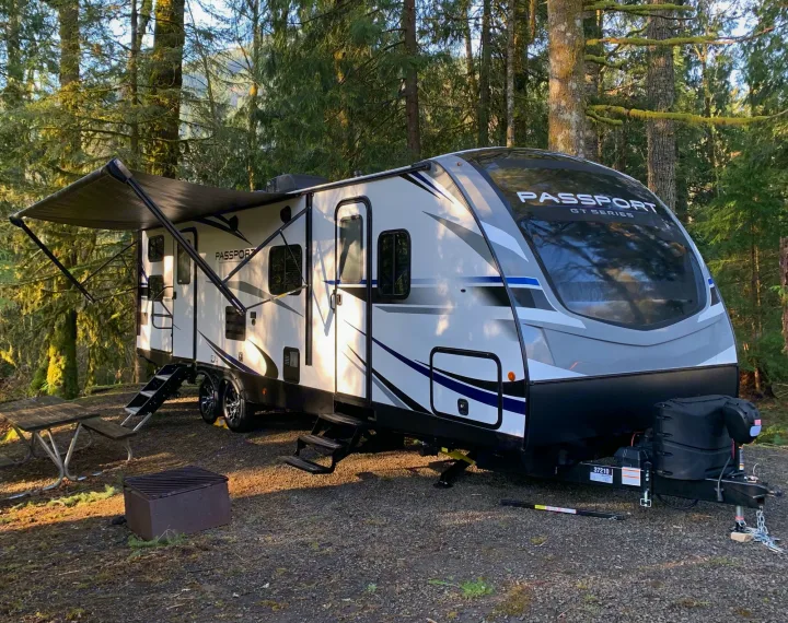 2 Entrances, Outdoor Kitchen, 18’ Awning and Outdoor Shower. Keystone Passport 2021