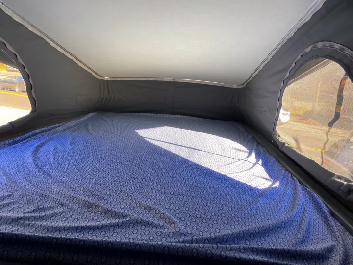 This is the bed in the pop-up part - plenty of light and roomy!. Winnebago Other 2021
