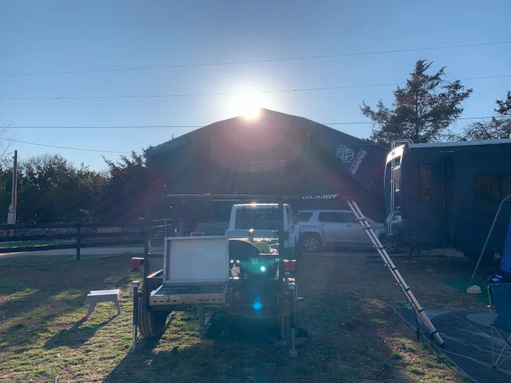 Sundown experiencing the sun setting! Notice the large hitch grill setup in the rear!. iKamper X-Cover 2020
