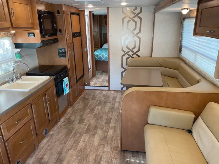 Kitchen, dining, and living space. Winnebago Minnie Winnie 2017