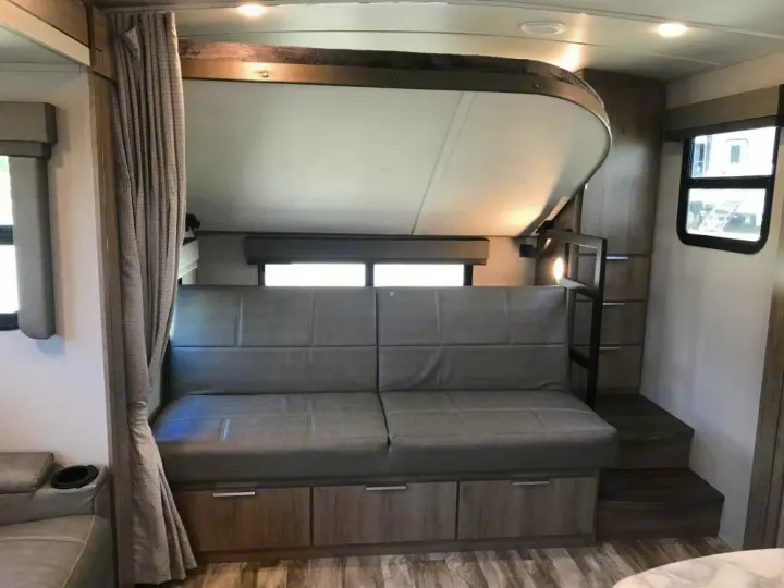 Lower bunk in couch position and top bunk up. Grand Design Other 2021