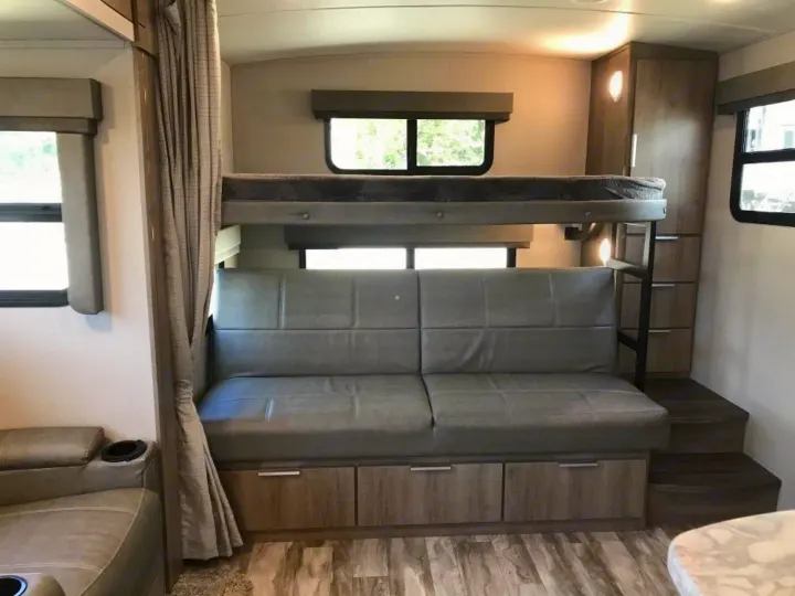 Lower bunk in couch position and upper bunk down. Grand Design Other 2021