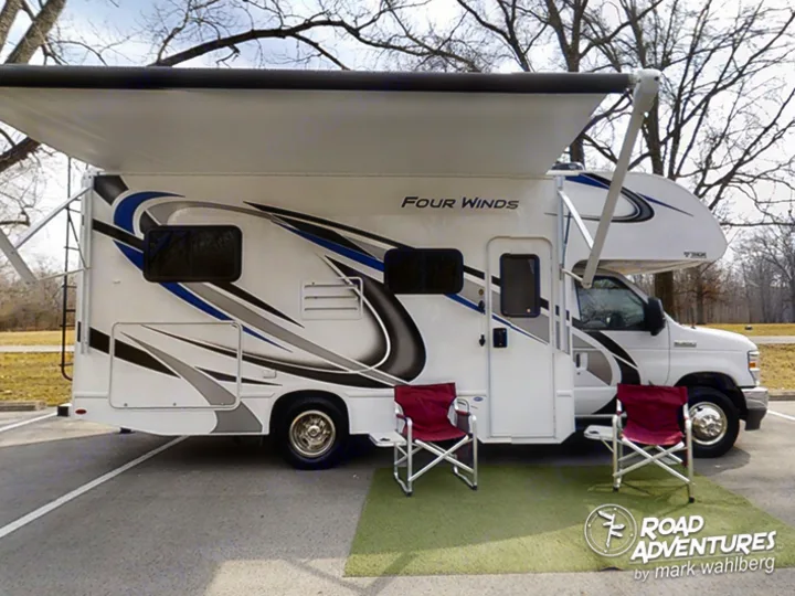 Passenger side with awning extended. Thor Motor Coach Four Winds 22E 2022