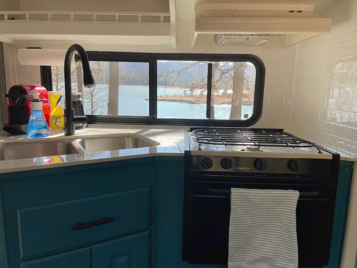 View of the lake from renovated kitchen, showing the Nespresso coffee machine.. Coachmen Santara 2001