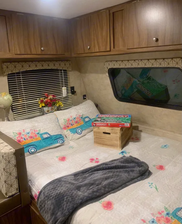 This queen bed is located at the opposite end of the bunkbeds, making it just a bit quieter for those that want to sleep while others are up.. Forest River Viking 2018