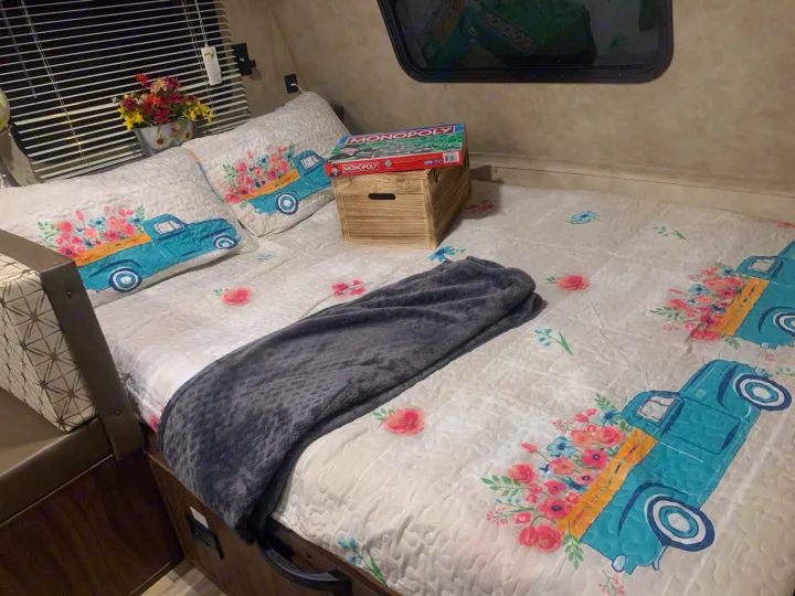 This queen bed is located at the opposite end of the bunkbeds, making it just a bit quieter for those that want to sleep while others are up.. Forest River Viking 2018