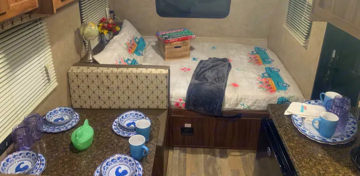 This queen bed is located at the opposite end of the bunkbeds, making it just a bit quieter for those that want to sleep while others are up.. Forest River Viking 2018