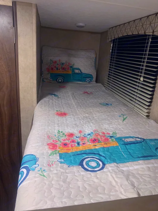 The head of each bunk is tucked away behind a wall providing a bit of privacy and quiet time if so desired.  Each bunk also has its own light.. Forest River Viking 2018
