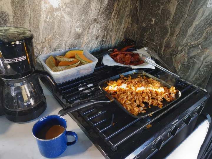 RV rental breakfast: chorizo eggs, crispy bacon, and fresh melon. Coffee from a Black+Decker maker on a Dometic stove.. Other Attitude 2021