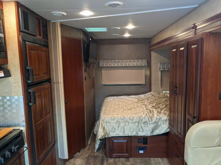 Experience comfort in this RV rental featuring a cozy bedroom, full kitchen, and smart storage solutions for your travels.. Forest River Sunseeker 2016