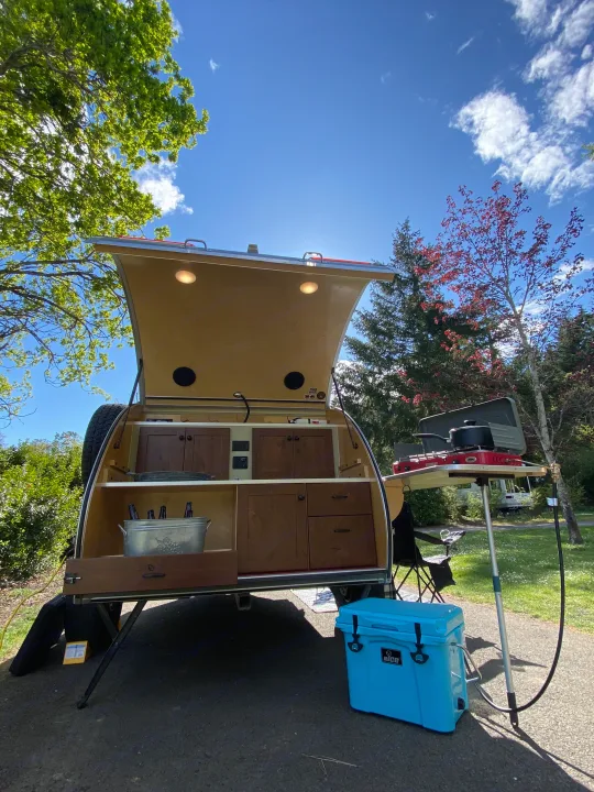 Even at night you can make and enjoy a meal with the exterior porch and the overhead galley lights.. Aero Steel HC 2018