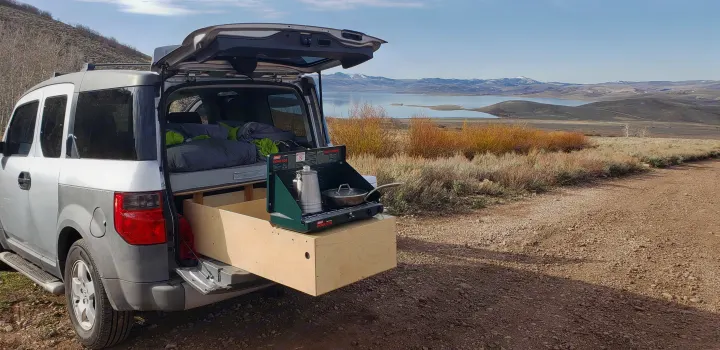 Honda Element car camp setup: a pull-out stove/bed & stunning lake view. Perfect for an RV rental experience!. Honda Element 2003