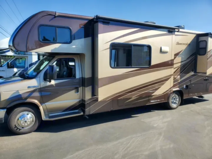 Two-tone brown and beige Sunseeker Class C motorhome. Perfect for your next rv rental and unforgettable travel adventures.. Forest River Other 2017
