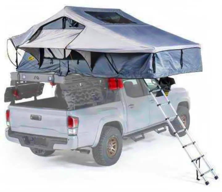 RV rental: Pickup truck with a deployed rooftop tent and ladder, packed for camping and overlanding.. Smittybilt Overlander XL Gen 2 RTT 2021