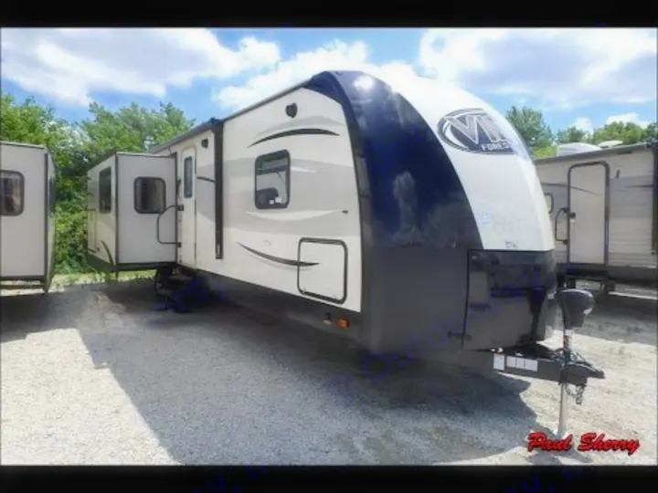 Modern white & black Forest River travel trailer RV with slide-out. Ideal for your next rv rental adventure.. Forest River Vibe 2016
