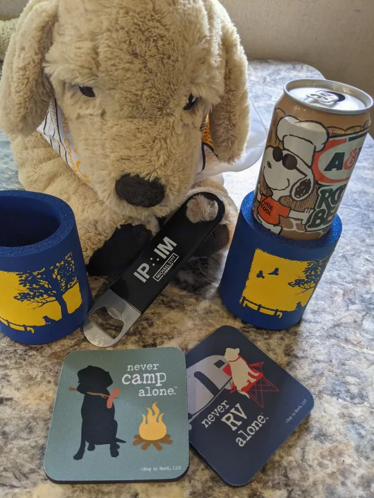 Dog plush, Snoopy root beer, koozies, and "never RV alone" coasters for your next rv rental adventure!. Other Other 2017