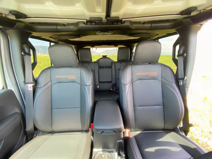 Luxury Jeep Rubicon 392 interior with black leather seats and open-air feel, perfect for an rv rental adventure with scenic views.. Jeep Wrangler Unlimited Rubicon 392 2021