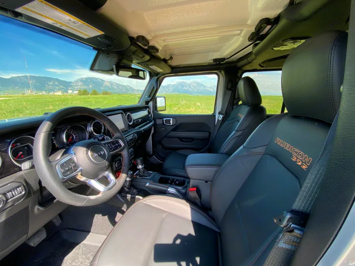 Inside a Jeep Rubicon 392 with mountain views, perfect for scenic drives. Consider an RV rental for your next adventure!. Jeep Wrangler Unlimited Rubicon 392 2021