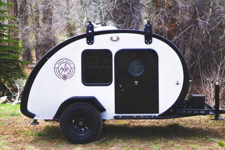 White teardrop camper trailer, perfect for your next outdoor adventure. Check out this unique RV rental!. Bean Trailer Mean Bean 2021