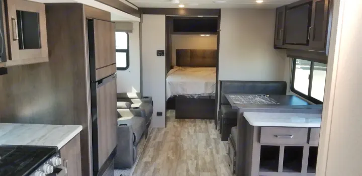 Queen-size bed room comes with a 4" memory foam and freshly washed linens. . Grand Design Transcend Xplor 2021