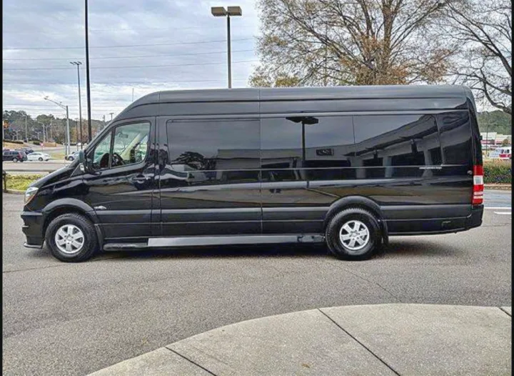 A black Mercedes-Benz Sprinter van, a sleek option for rv rental or luxury transport, parked on asphalt. Perfect for trips.. Mercedes 3500 2018