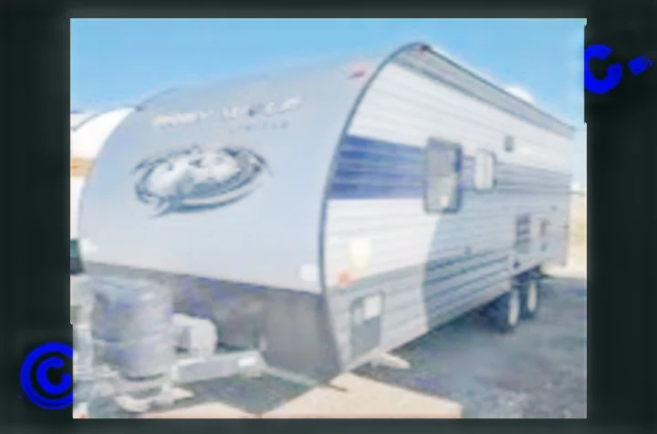 This grey & blue Grey Wolf travel trailer is ready for your next RV rental adventure. Ideal for camping trips!. Forest River Cherokee Grey Wolf 2021