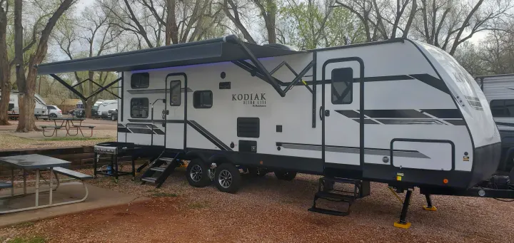 Outside complete with awning and lights.  2 entrances.. Dutchmen Kodiak 2021