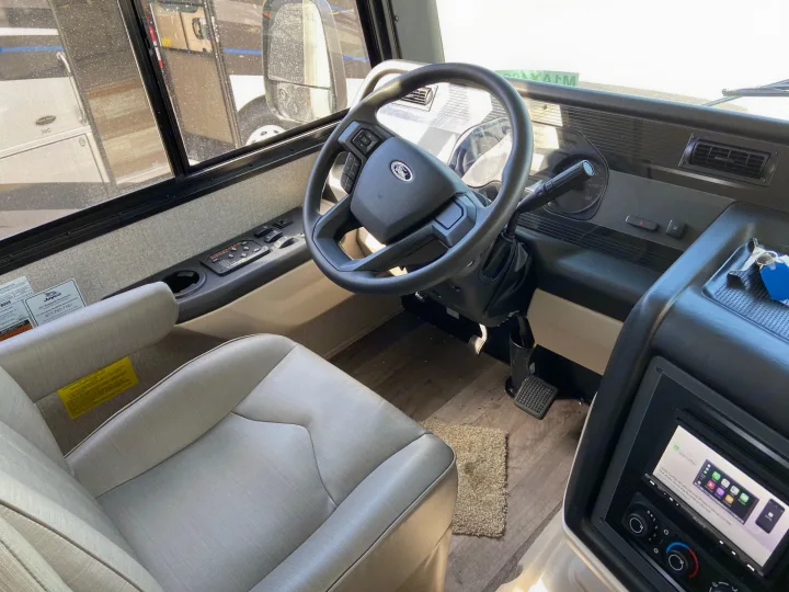 Experience your RV rental's comfortable driver's seat, Ford steering wheel, and modern dashboard with Apple CarPlay.. Jayco Alante 2021