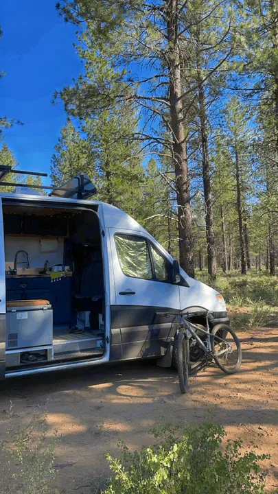 Bend, Oregon in the Deschutes National Forest. Blackout curtains keep the interior cool after a long, dusty trail ride. . Dodge Sprinter Van 2008