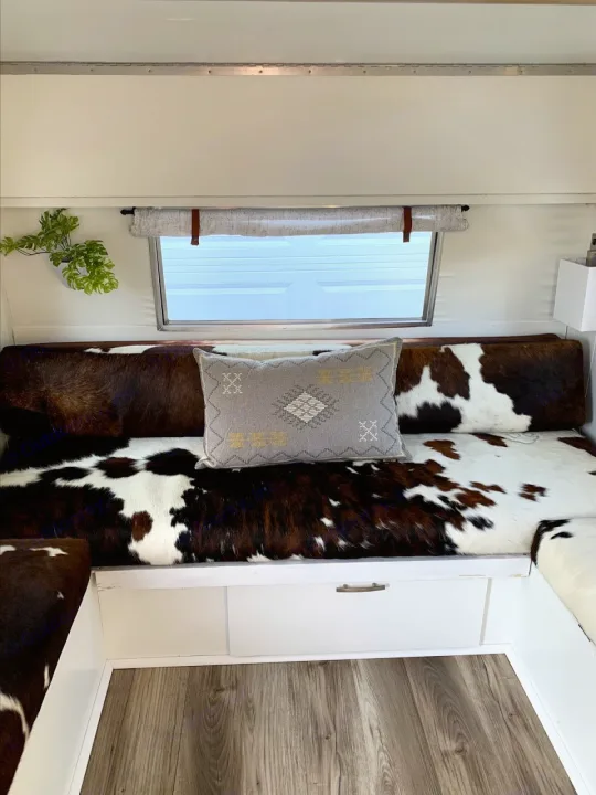 Experience comfortable compact living in this RV rental! Features cowhide seating & smart storage.. Shasta Compact 1968