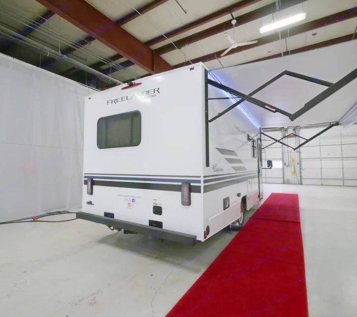 White Coachmen Freelander RV motorhome with an extended LED-lit awning, ready for your next RV rental adventure.. Coachmen Freelander 23FS 2022