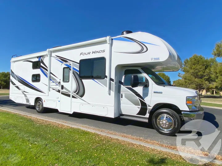 Ready for adventure, this white Four Winds Class C motorhome is available for your next RV rental journey.. Thor Motor Coach Four Winds 2021
