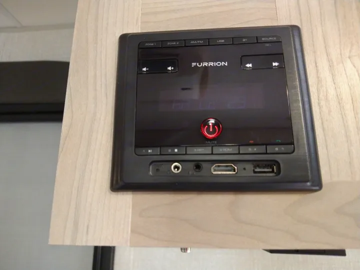 Furrion multimedia system in an RV rental, offering audio, USB, Bluetooth, and HDMI connectivity for entertainment on the go.. KZ 181BH 2021