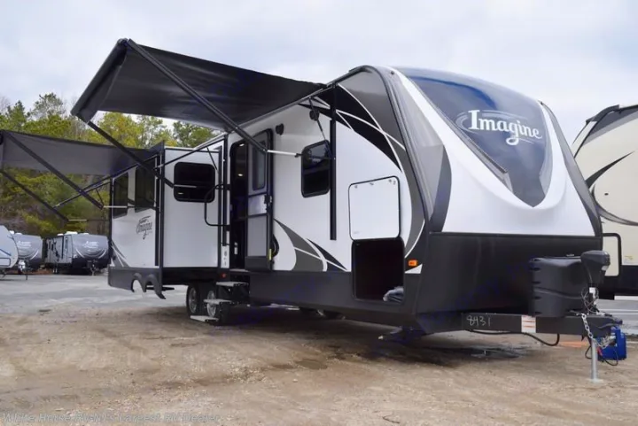 Camper has 2 awnings that provide plenty of shade in the warm Texas summer. Grand Design Imagine RL2970 2019