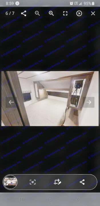 Spacious RV rental bedroom featuring a comfortable bed, overhead storage, and bright interior lighting.. Prime Time 2020 Prime Time Tracer 2021