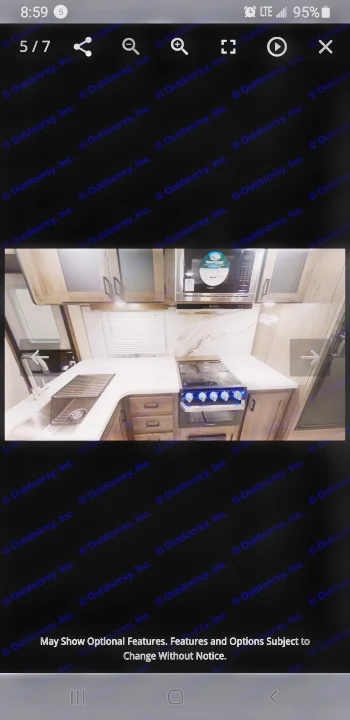 Step inside a spacious, modern RV rental kitchen, complete with a sink, stovetop, microwave, and stylish cabinets.. Prime Time 2020 Prime Time Tracer 2021