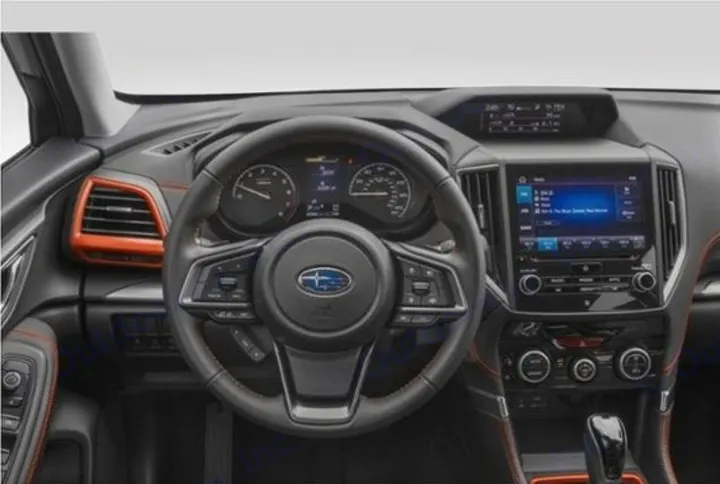 Detailed car interior: dashboard, steering wheel, and display. Ideal vehicle choice, even if not an rv rental.. Subaru Forester 2021