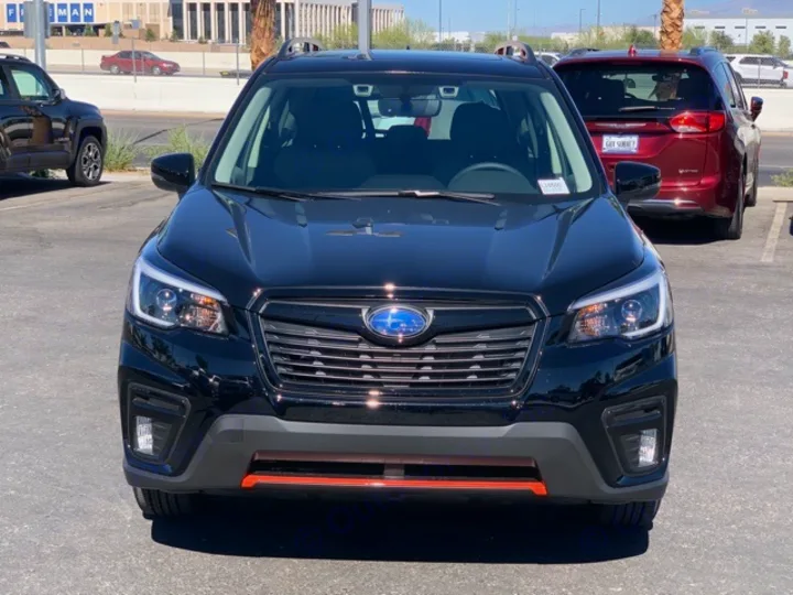Front view of a black Subaru Forester SUV in a lot. Ideal car for adventure, check our vehicle & rv rental options!. Subaru Forester 2021