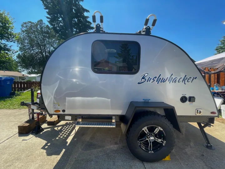 Experience outdoor adventures with this compact Bushwhacker RV rental, featuring robust tires & roof racks.. Braxton Creek Bushwhacker 2021