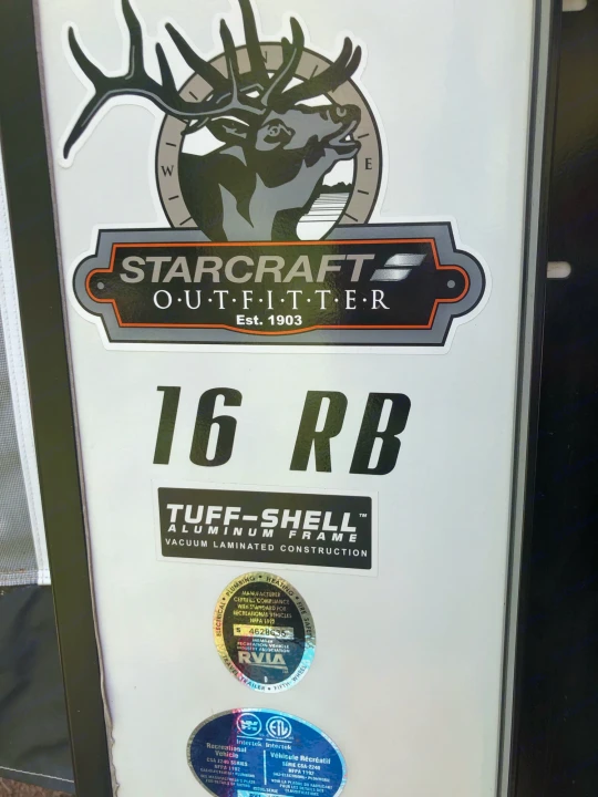 Side view of a Starcraft 16 RB rv rental, highlighting its Tuff-Shell construction and RV certifications.. Starcraft Launch 2018