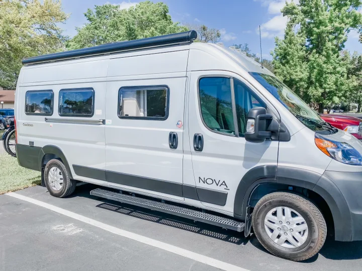 Light gray Coachmen Nova Class B RV rental parked outdoors, ready for adventure.. Coachmen Nova 2021