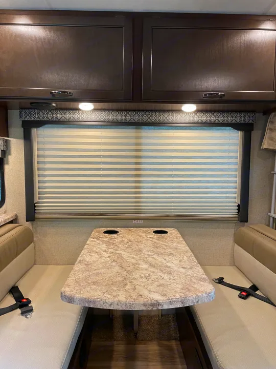 Dinette has two seat belts to use on the road and seats four adults at mealtime.  Forward facing bench also includes LATCH anchor.. Thor Four Winds 2020