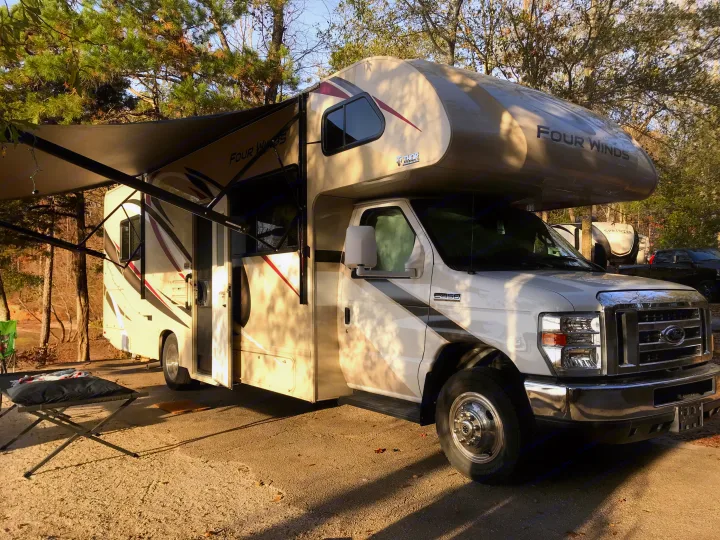 Camp side awning with LED strip lights for night time activities.. Thor Four Winds 2020